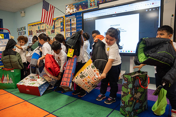 children-opening-gifts.jpg