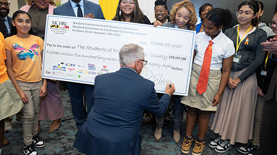 Gentleman signing check