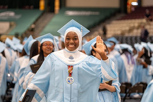 2026-Eleanor-Roosevelt-graduate-holding-diploma