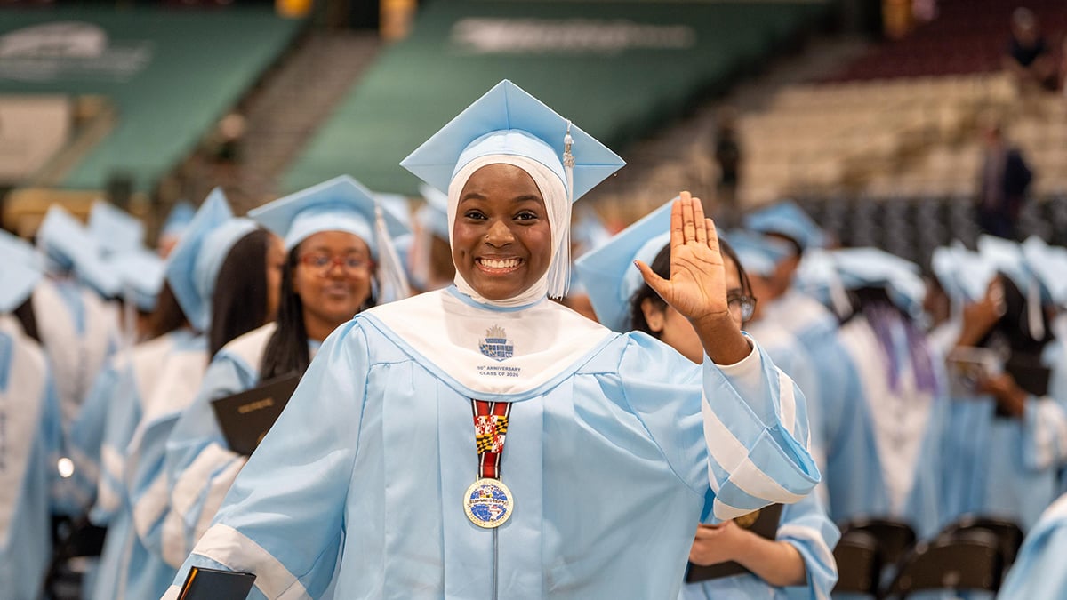 2026-Eleanor-Roosevelt-graduate-holding-diploma