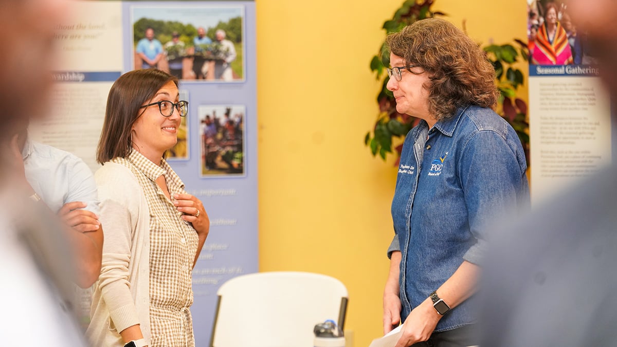 Climate-change-conference-staff-members-talking.jpg