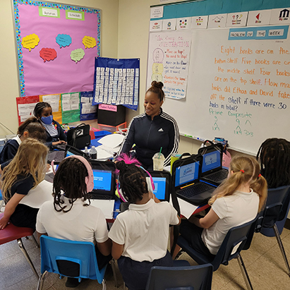 PD-teacher-leading-enrichment-activity-with-Chromebooks.jpg