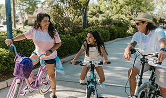 T-adults-and-child-riding-bicycles.jpg